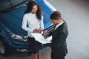 girl-is-smiling-female-customer-modern-stylish-bearded-businessman-automobile-saloon.webp