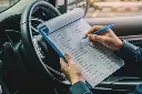 machinic-man-customer-car-writing-clipboard-checklist-repair-machine.webp