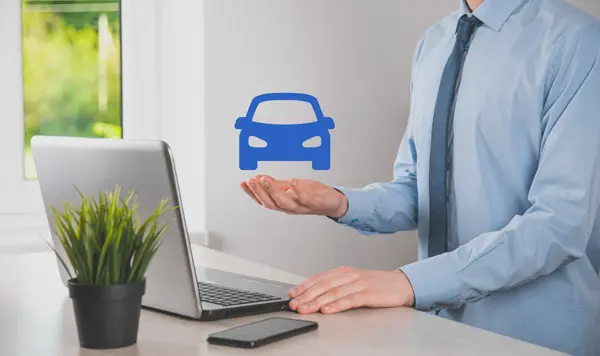 digital-composite-man-holding-car-iconcar-automobile-insurance-car-services-concept.webp